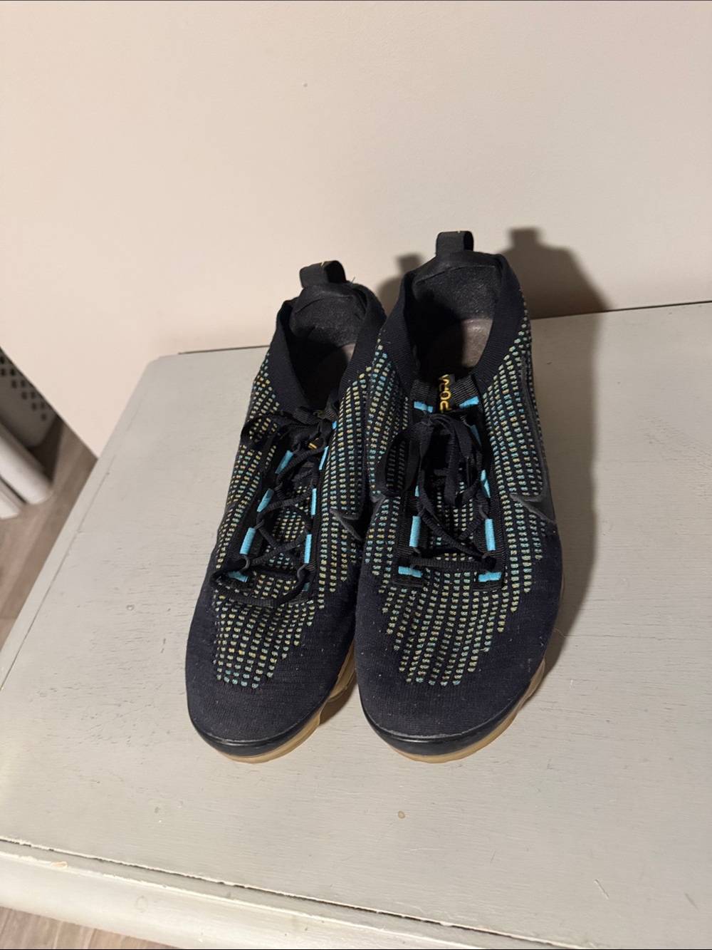 Nike Black Athletic Shoes with Teal and Yellow Accents